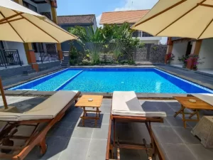 tunjung boutique resort, sunbed, pool umbrella