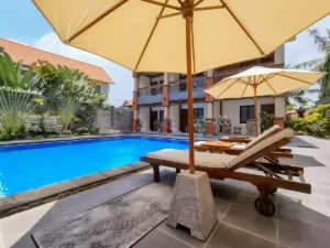tunjung boutique resort, pool umbrella, sunbed